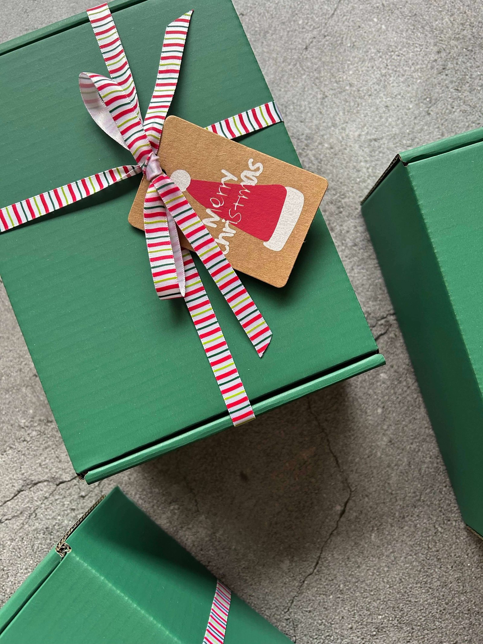 Festive gift box with candle and botanical details