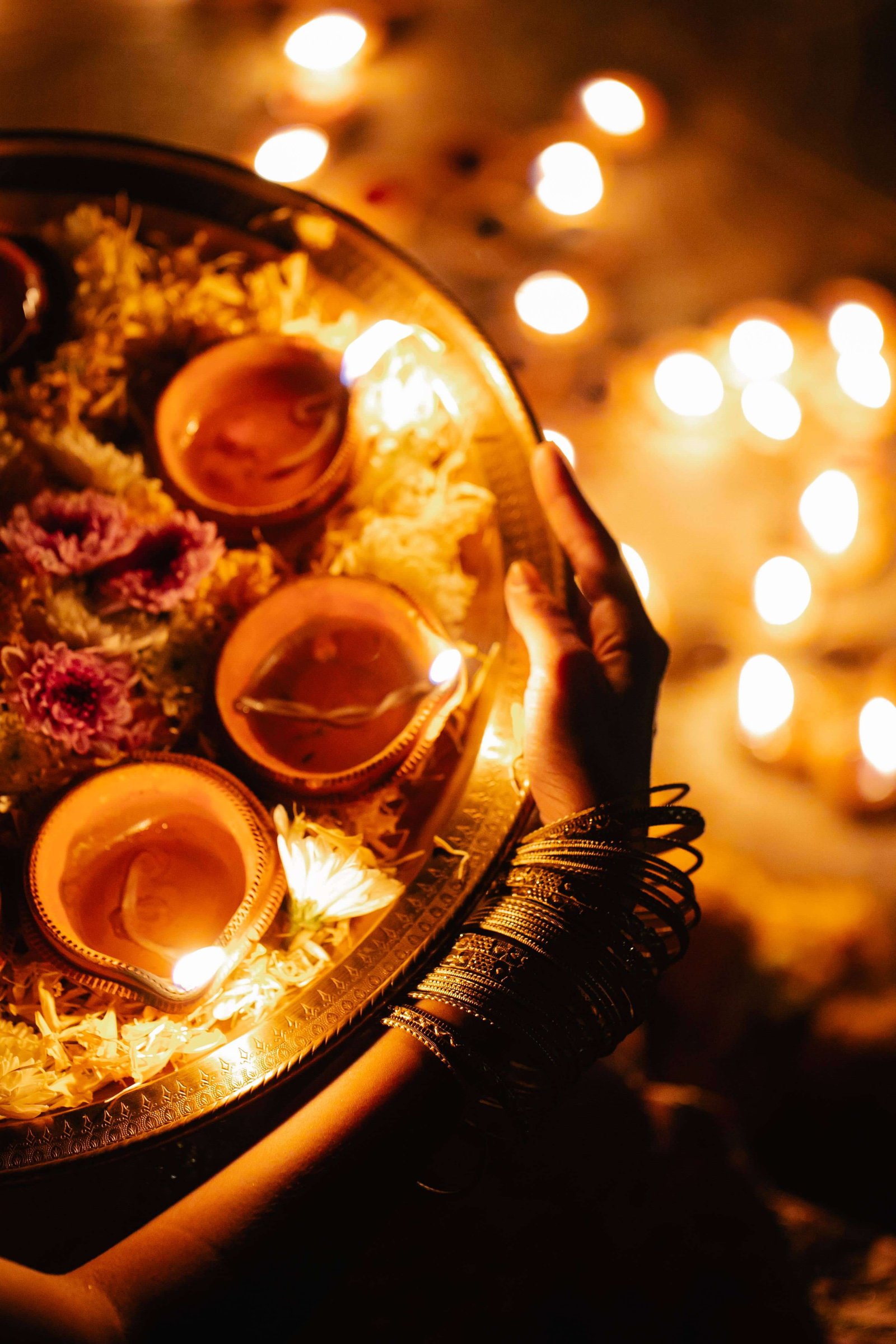Glowing festive candles and gifts for Diwali