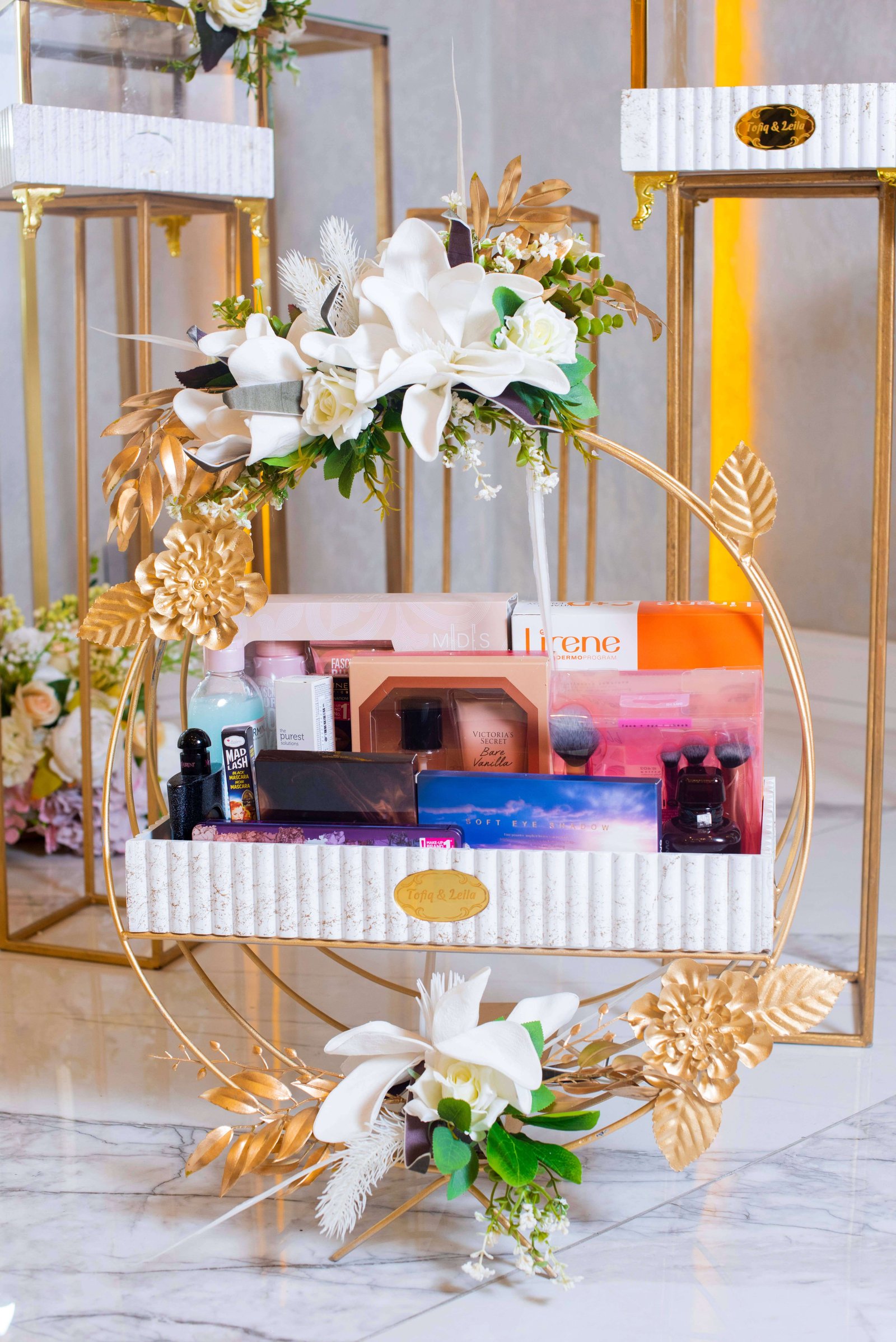 Curated gourmet gift hamper with ribbon and treats